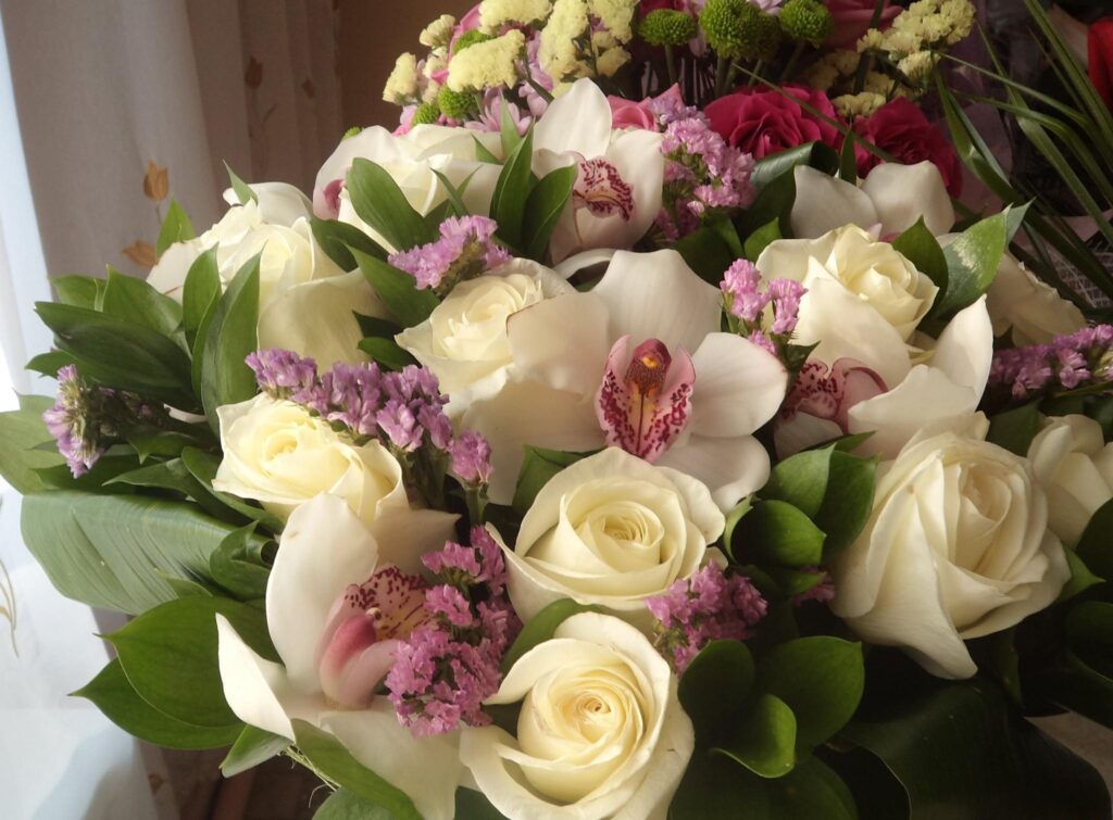 Elegant White Roses & Orchids Wallpaper for a Serene Background