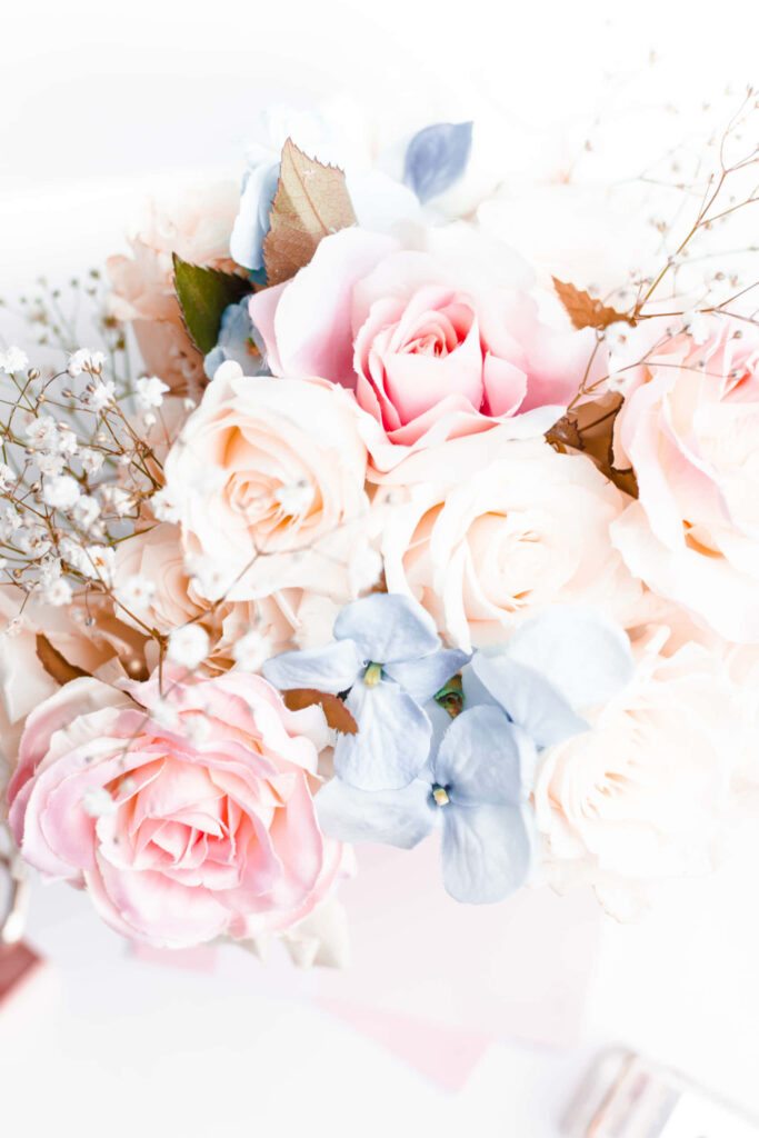 Stunning Flower Bouquet Wallpaper: Pink Roses & Soft Blue Background