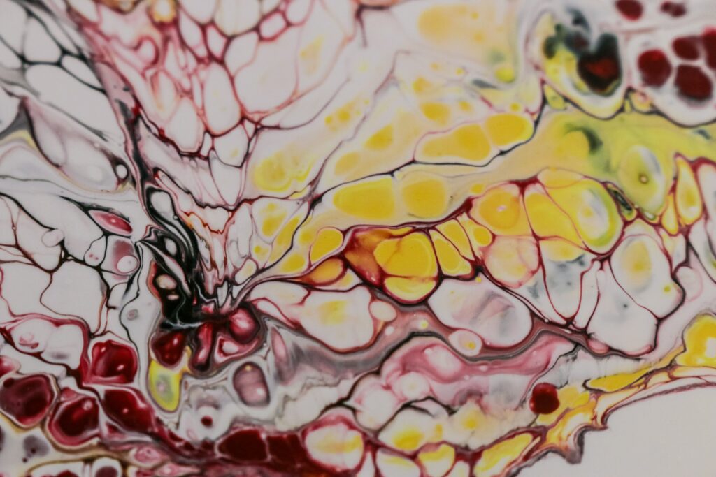 Mesmerizing Fluid Art Wallpaper: Maroon, Yellow & Black Patterns