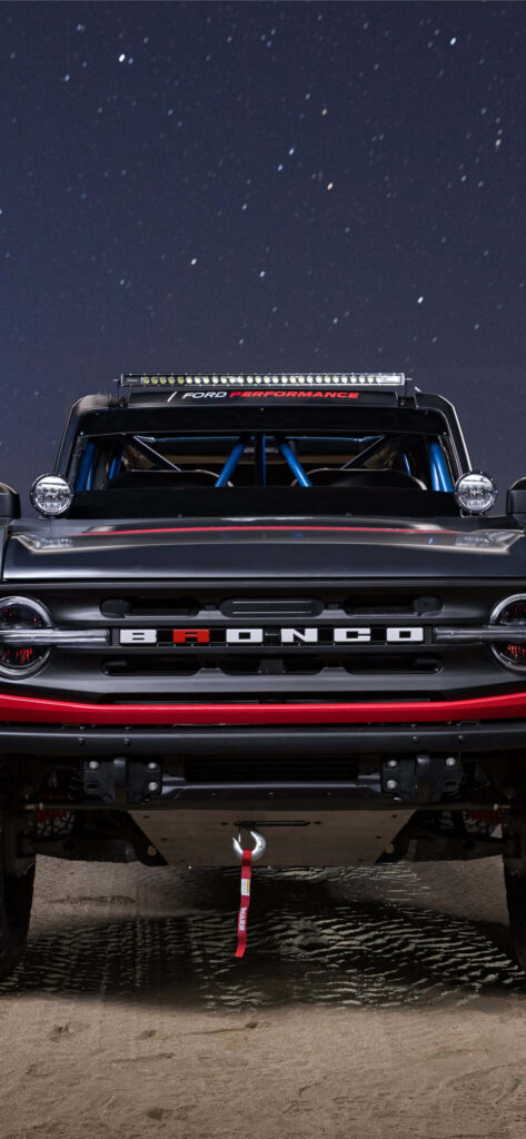Epic Ford Bronco Wallpaper: Rugged Power Under a Starlit Sky