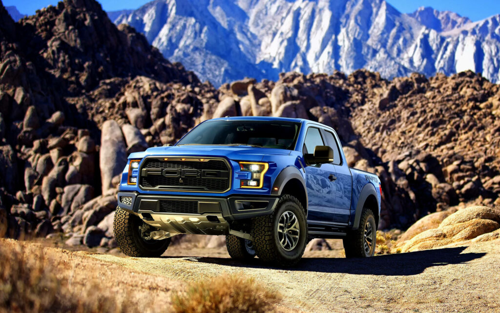 Ford F-150 Raptor Wallpaper: Bold Truck in Beautiful Rocky Landscape