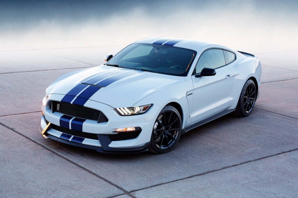 Sleek Ford Mustang Shelby Wallpaper: Bold Blue Stripes & Style