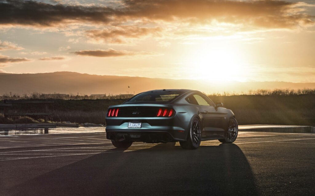 Ford Mustang Sunset Wallpaper: Stunning Car in Serene Setting