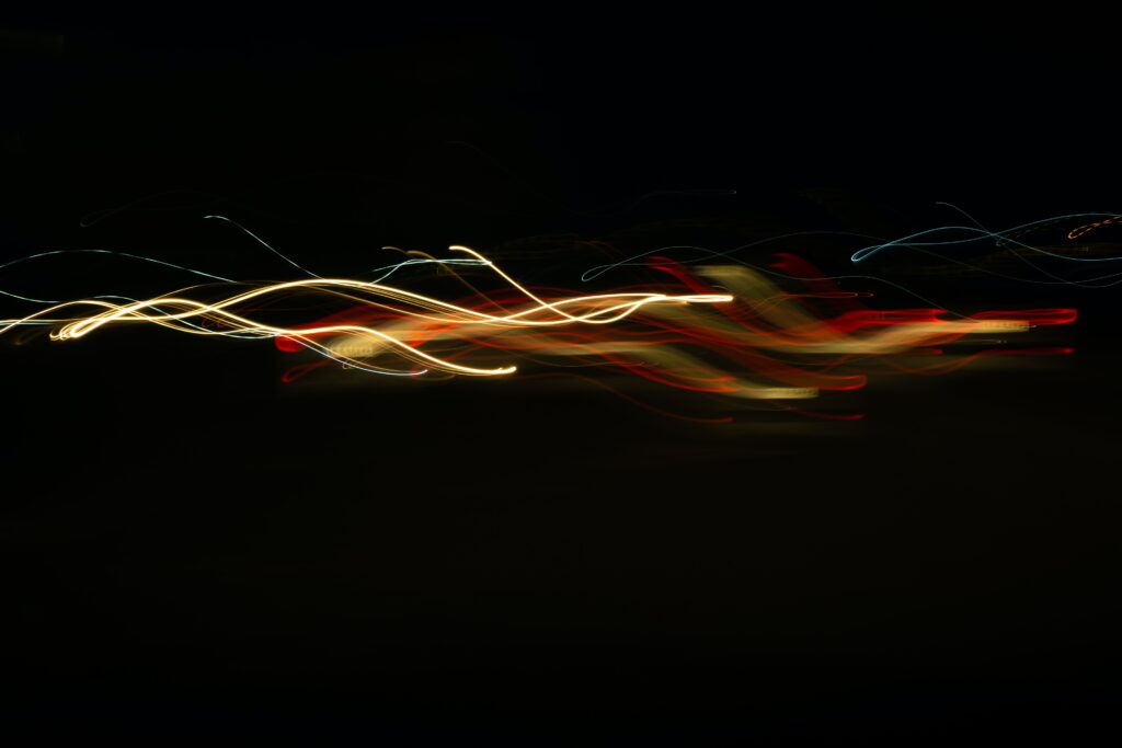 Mesmerizing Freezelight Wallpaper: Dynamic Long Exposure Art Background