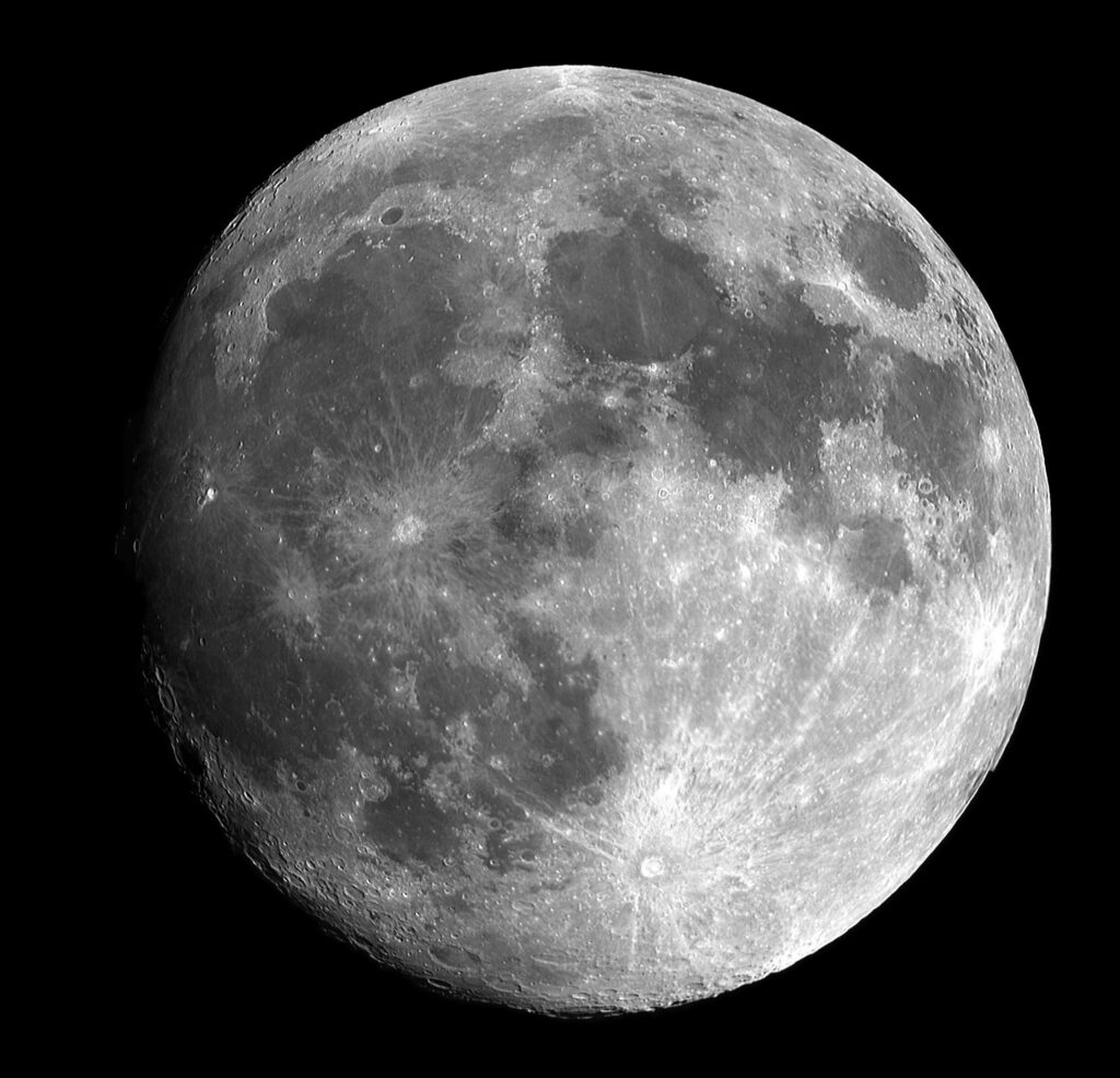 High-Resolution Full Moon Wallpaper Against Black Background