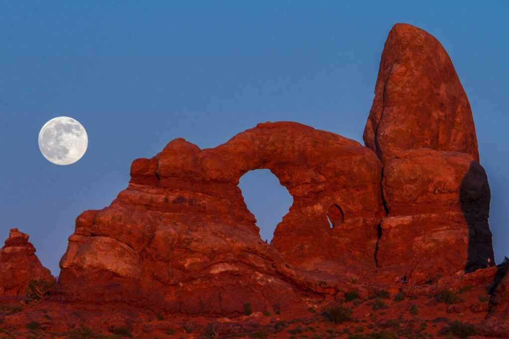Stunning Full Moon Wallpaper Over Arches National Park's Red Rocks