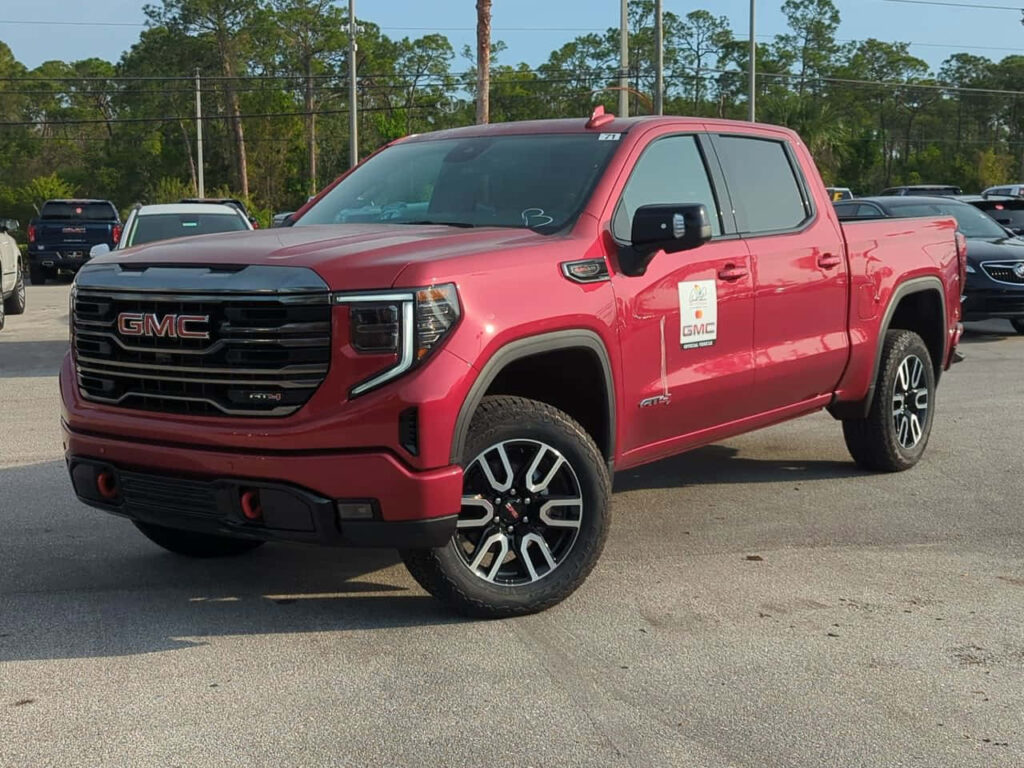 Stunning GMC Sierra AT4 Wallpaper: Rugged Power in Outdoor Setting