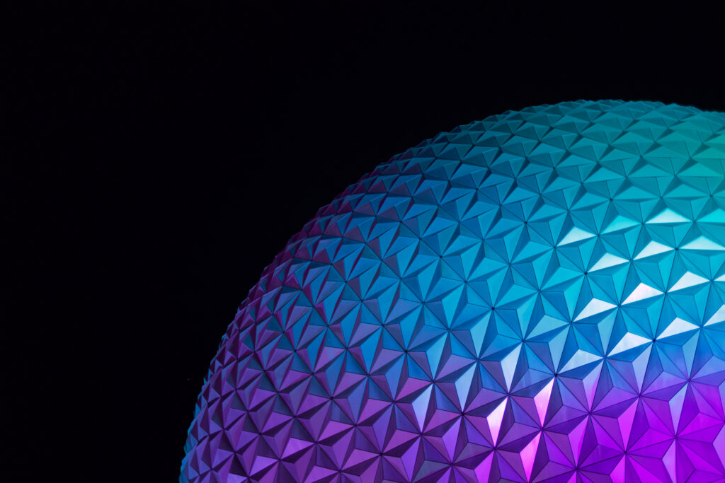 Vibrant Blue-Purple Geometric Wallpaper on Black Background