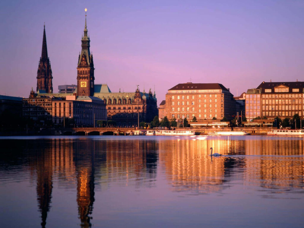 Serene German Waters Reflecting Historic Architecture - Wallpaper Background
