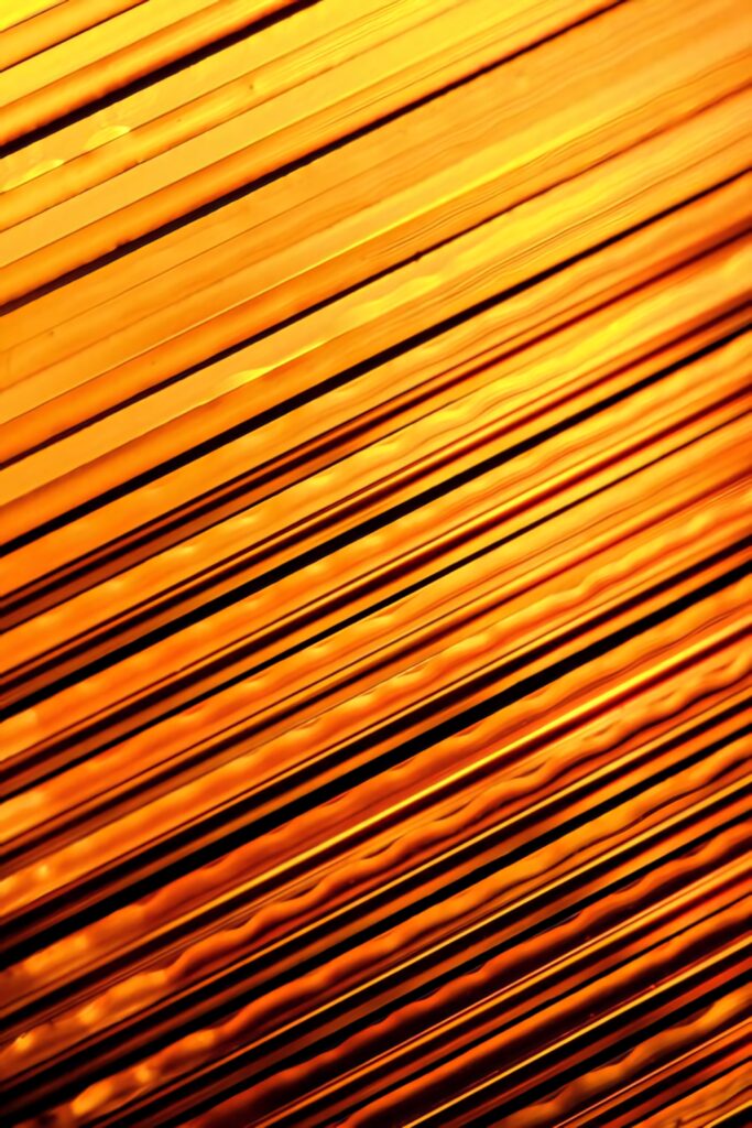 Rich Gold Texture Wallpaper with Sleek Diagonal Lines Design