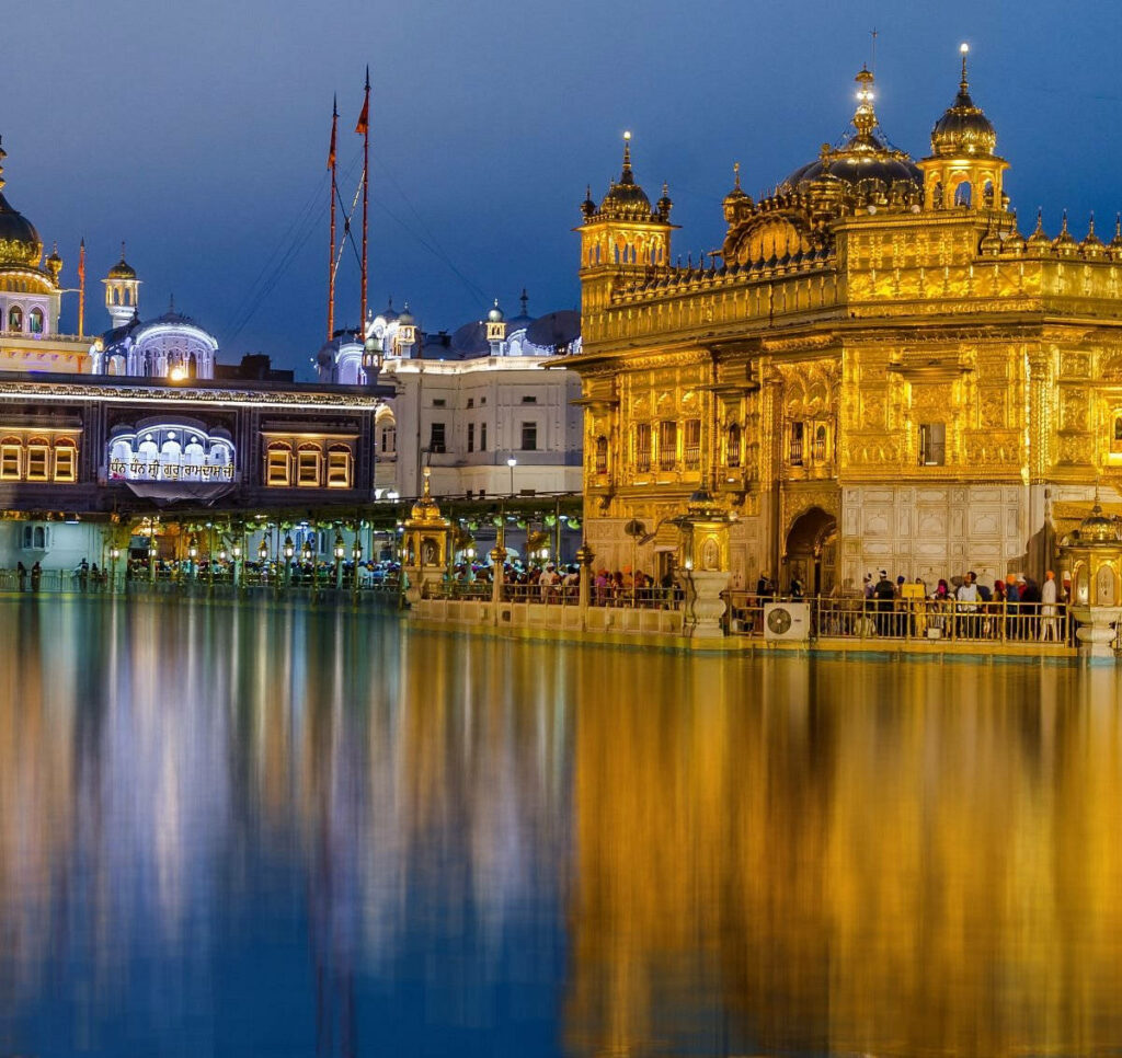 Stunning Golden Temple Night View Wallpaper - Amritsar Reflection