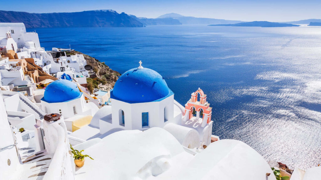 Greece Wallpaper: Iconic Whitewashed Buildings & Aegean Sea Views