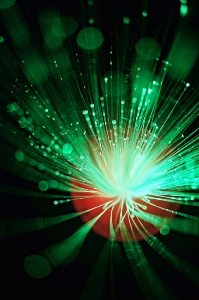 Stunning Green Optical Fiber Wallpaper with Bokeh Effect