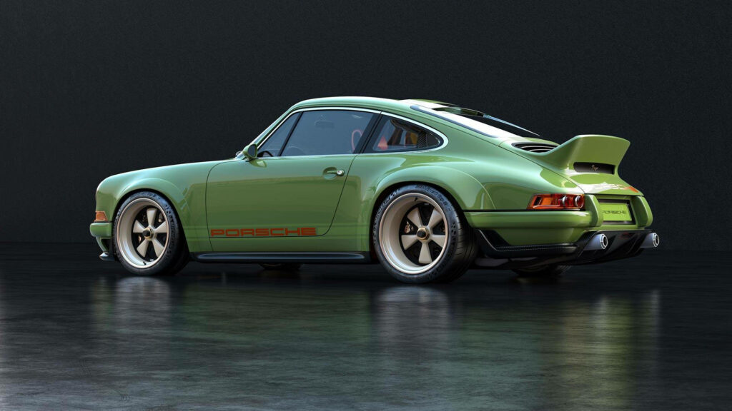 Stunning Green Porsche 911 Wallpaper: Retro Design & Aerodynamic Curves