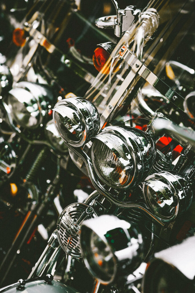 HD Motorcycle Wallpaper: Gleaming Headlights & Chrome Design