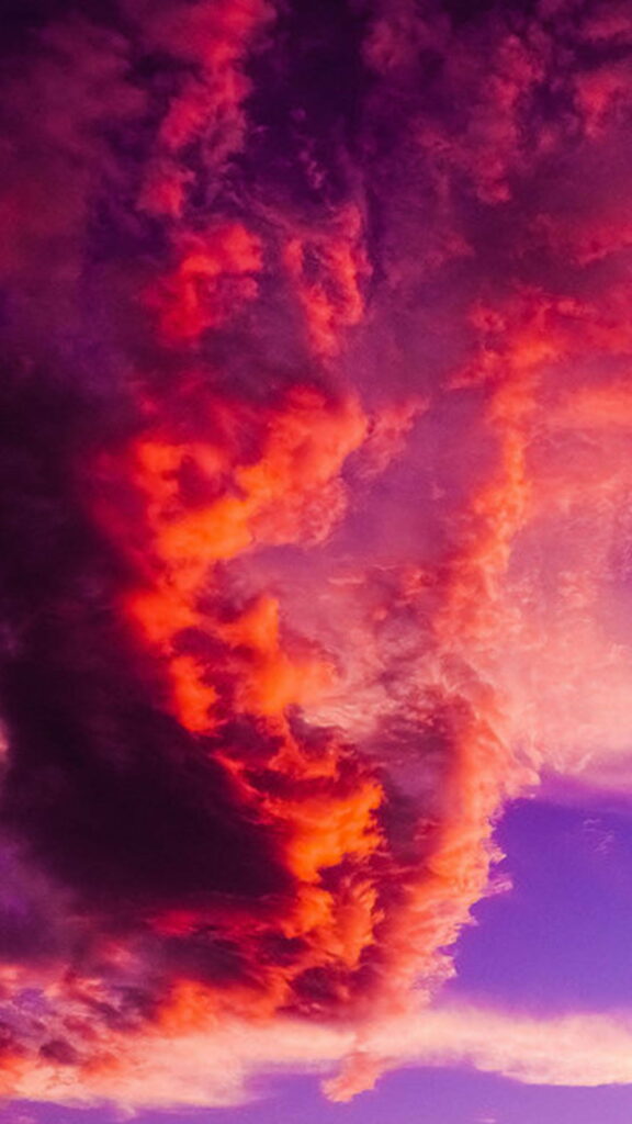Vibrant HD Phone Wallpaper: Dramatic Red & Purple Sky Background