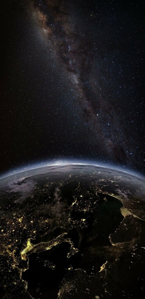 Rogue Planet Roams the Cosmic Galaxy: A Stunning HD Wallpaper for Your Phone's Background, Revealing Earth's Beauty in the Vastness of Space