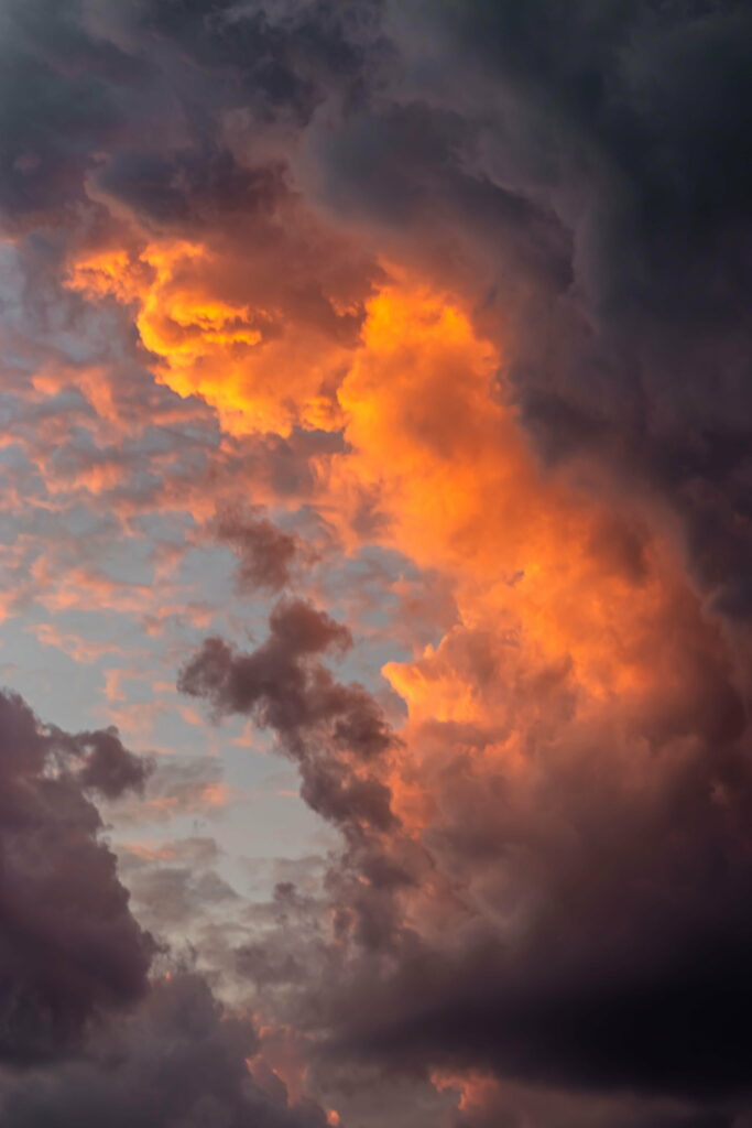 Stunning HD Sunset Wallpaper: Fiery Clouds in Orange & Pink