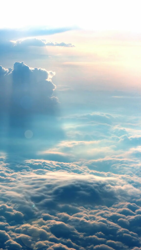 Stunning Sky Wallpaper: Dramatic Clouds & Soft Sunshine Background