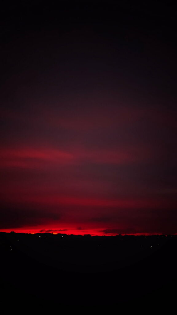 Stunning HD Sunset Wallpaper: Dramatic Red Sky & Dark Clouds