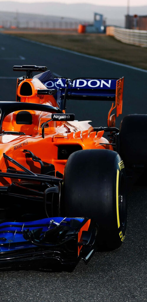 Vibrant Orange McLaren F1 HD Wallpaper - Racing Track Background
