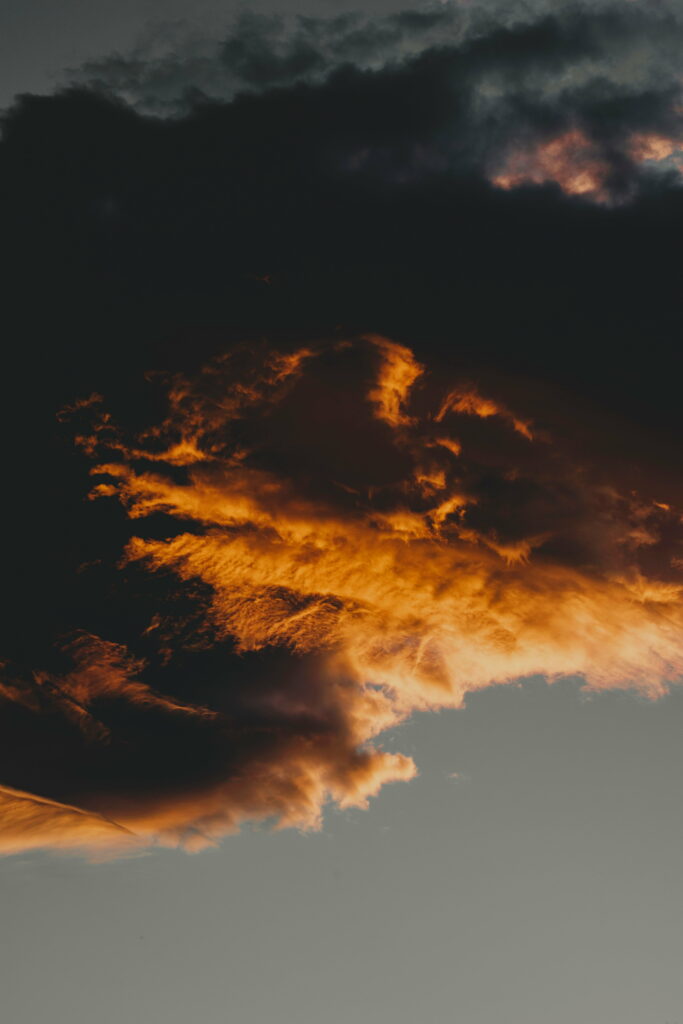 Stunning HD Sunset Sky Wallpaper: Dramatic Clouds & Orange Hues
