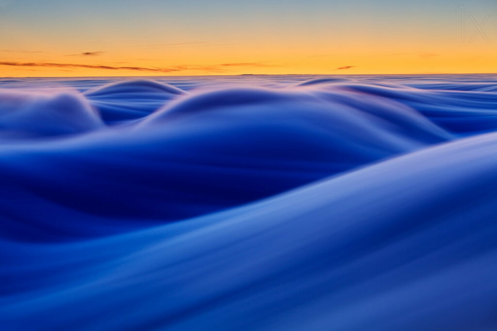 Surreal Blue Clouds & Golden Sunset HD Wallpaper - Tranquil Background