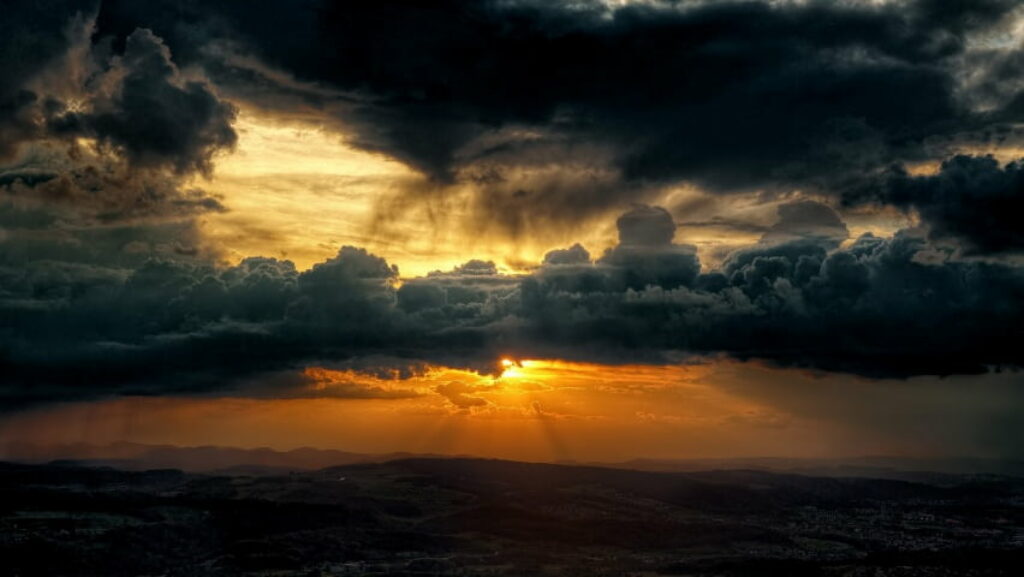 Stunning HD Wallpaper: Dramatic Sky with Golden Sunset Contrast