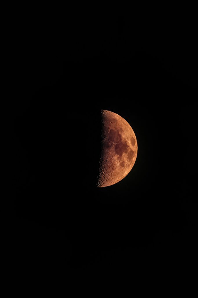 Half-Phase Moon Wallpaper: Stunning Detail Against Black Space
