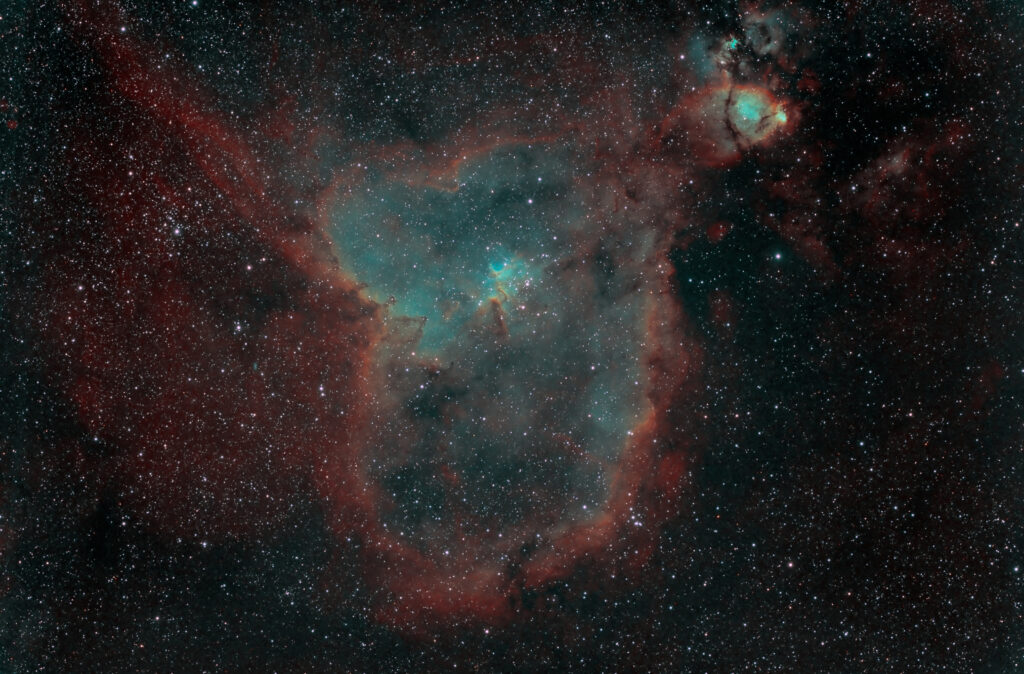 Stunning Heart Nebula Wallpaper: Vibrant Cosmic Scene Background