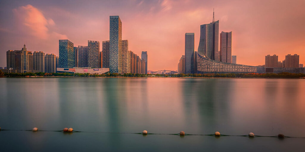 Hefei China Wallpaper: Serene Waterfront & Sunset Skyscrapers