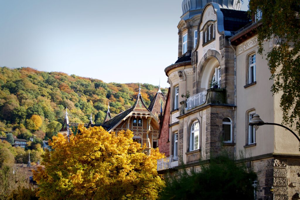 Stunning Heidelberg Architecture Wallpaper: Autumn Foliage Background