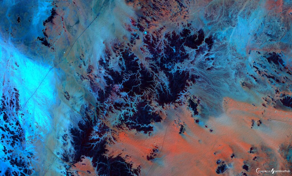 Stunning High-Res Earth Satellite Wallpaper: Blue & Orange Patterns