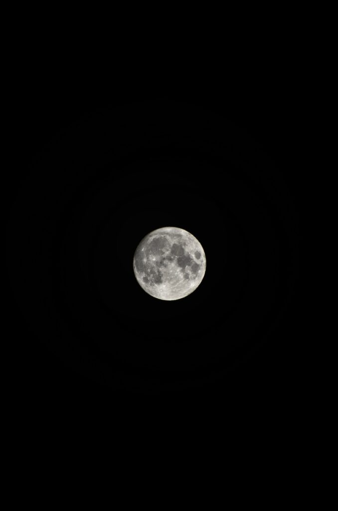 Stunning Moon Wallpaper: High-Res Detail Against Black Sky