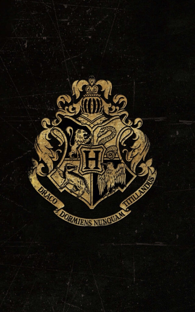 Stunning Gold Hogwarts Crest Wallpaper for Harry Potter Fans