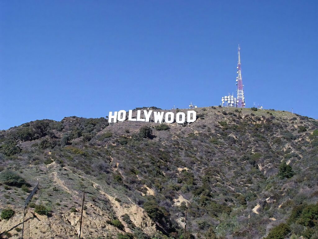Hollywood Sign & Cell Tower Against Vibrant Blue Sky - Wallpaper