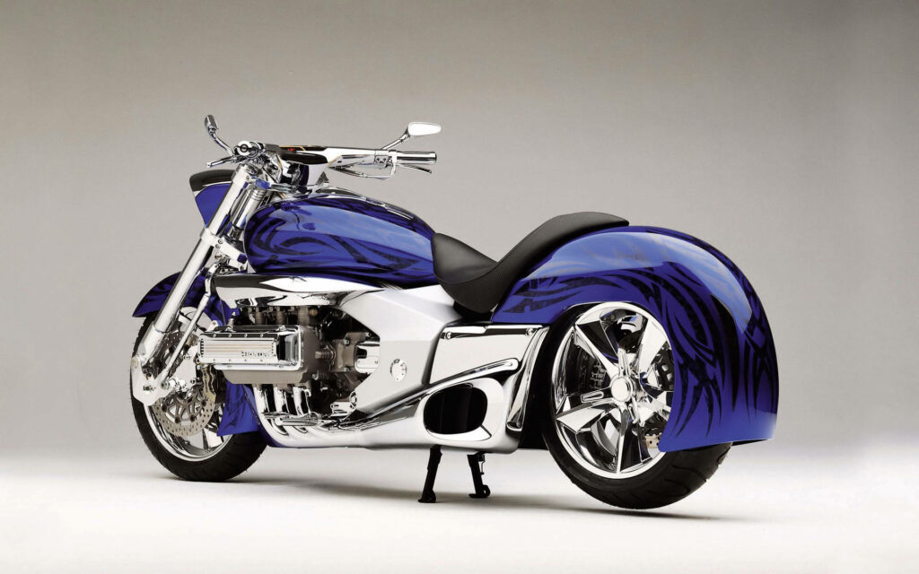 Futuristic Honda Valkyrie Rune Wallpaper: Bold Blue & Chrome Design