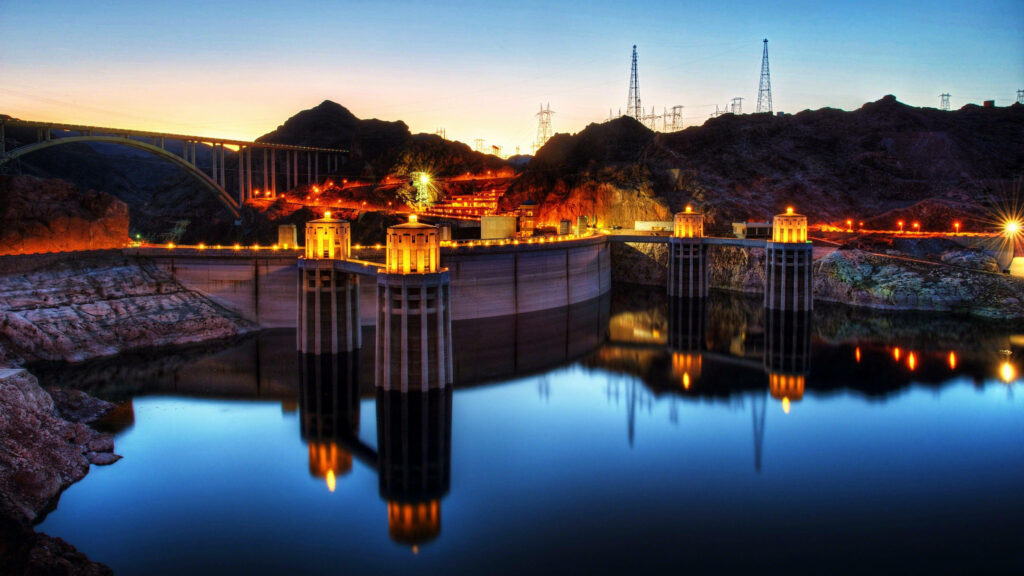 Stunning Hoover Dam Dusk View: Illuminated Reflections Wallpaper
