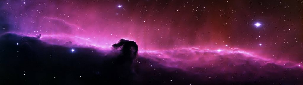 Horsehead Nebula space wallpaper with dark silhouette and vibrant magenta cosmic background