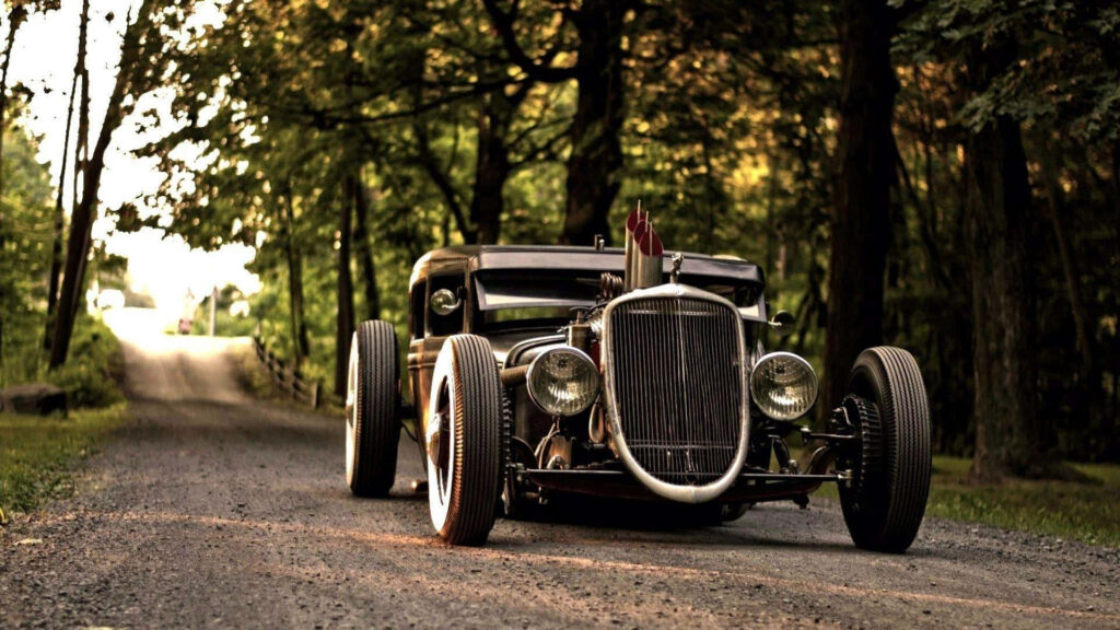 Hot Rod Wallpaper: Classic Car in Serene Tree-Lined Setting