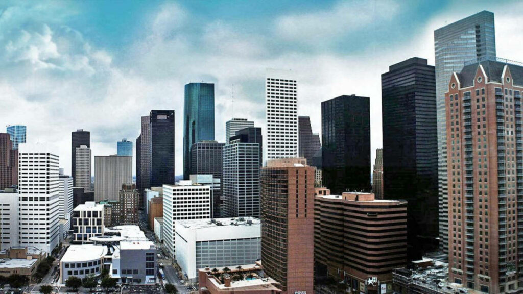 Stunning Houston Skyline Wallpaper: Modern Architecture & Cloudy Sky