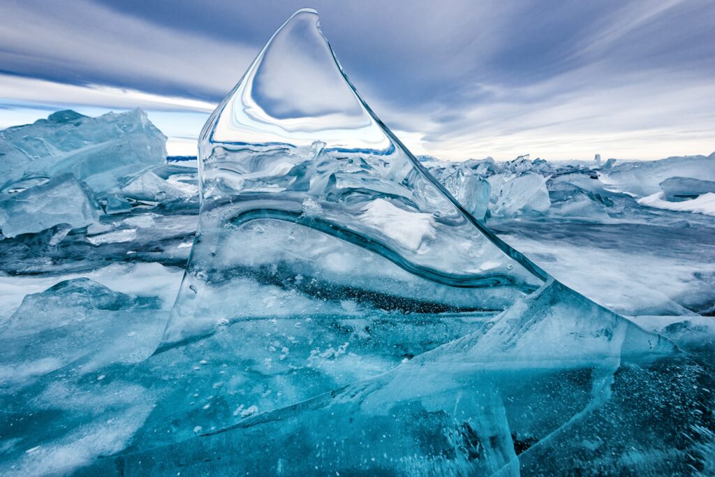 Stunning Macro Ice Wallpaper: Intricate Textures & Winter Sky