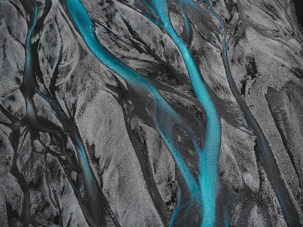 Icelandic Glacier Wallpaper: Intricate Textures & Vibrant Blue Streams