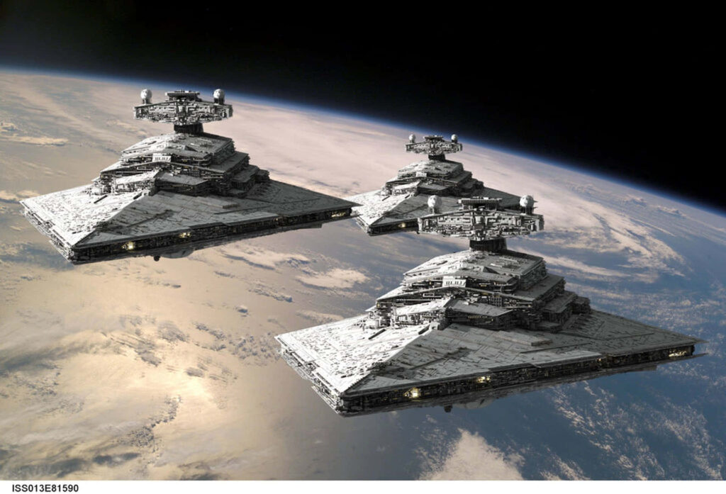 Imperial Star Destroyers Wallpaper: Majestic Space Scene with Earth