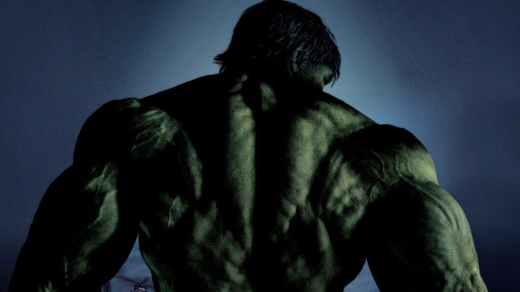 Stunning Hulk Wallpaper: Muscular Green Hero on Dark Background