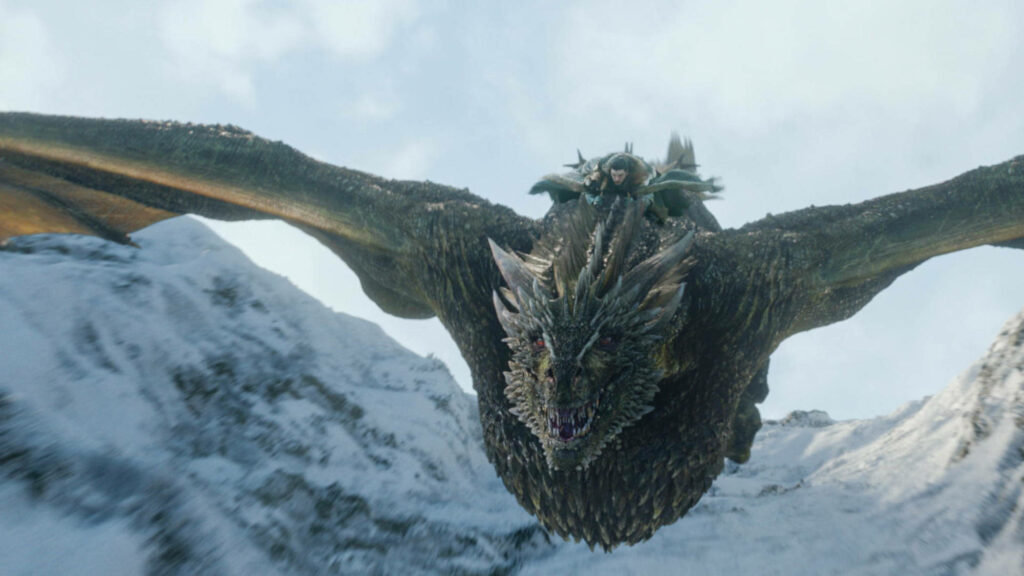 Epic Game of Thrones Wallpaper: Jon Snow on Rhaegal Over Mountains
