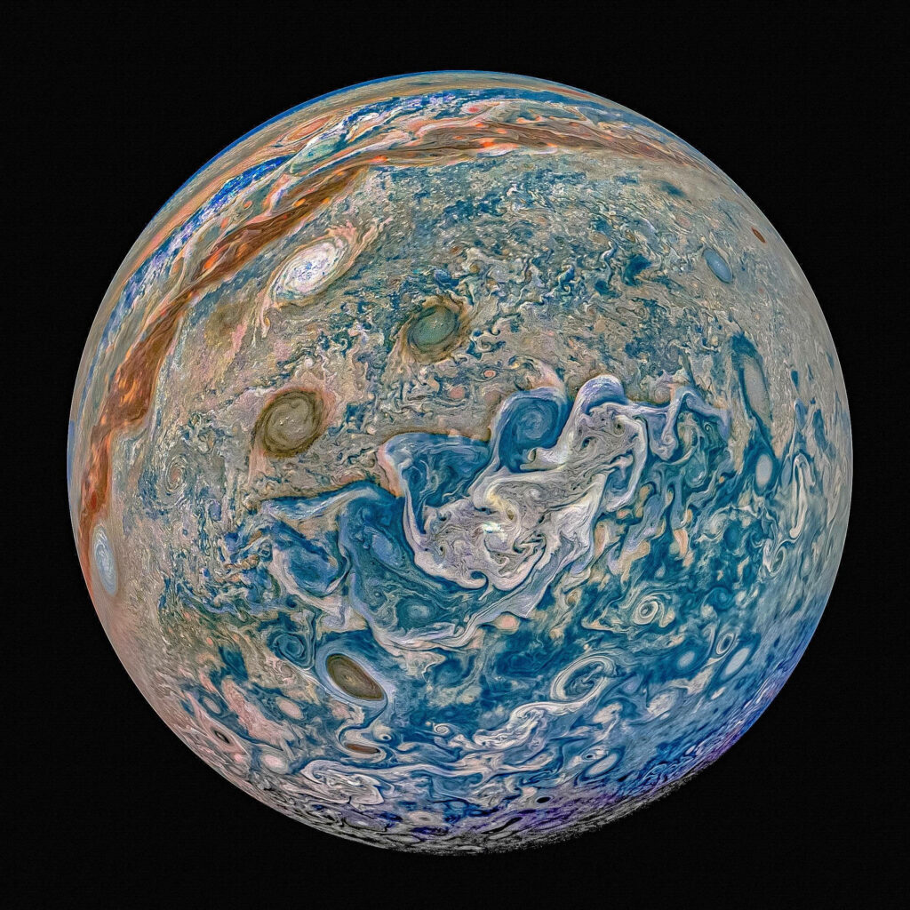 Stunning Jupiter South Pole Wallpaper: Vibrant Cloud Patterns by NASA