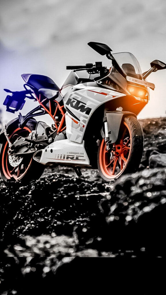 Stunning KTM Bike Wallpaper: Bold Design & Vibrant Orange Rims