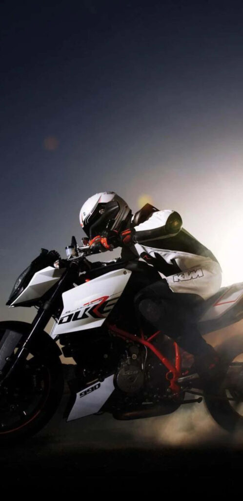 Dynamic KTM Motorcycle Wallpaper: Thrilling Ride in Action