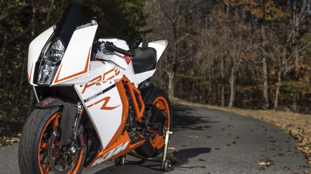 Power Meets Nature: KTM RC8 R Motorcycle Wallpaper in Autumn Setting